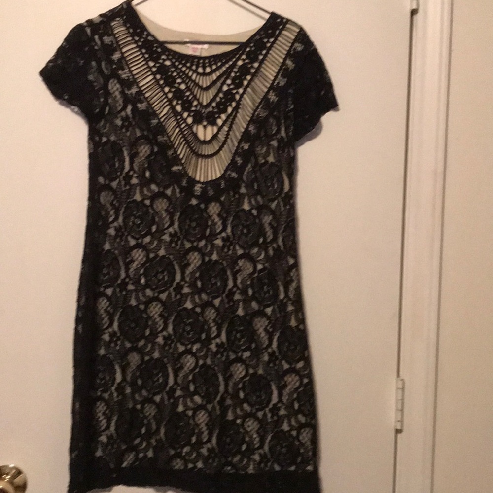 Beautiful black overlay with cream under dress
